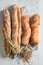 Rustic french baguettes with grains and ears of wheat