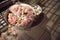 Rustic galvanised pails filled with summer flowers