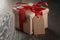 Rustic gift box with red ribbon bow and empty tag