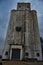 Rustic grain elevator in kansas along the rail tracks