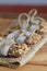 Rustic Granola Bars in a row and on Burlap with Twine