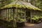 rustic greenhouse with moss-covered roof