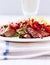 Rustic grilled pork fillet with tomato salsa and french fries