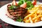 Rustic grilled steak with french fries