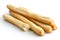 Rustic grissini bread sticks. Isolated on white. Broken with crumbs.