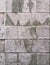 Rustic grungy urban brick wall in white and grey