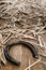 Rustic Horseshoe on Old Wood Barn Floor with Straw