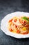 Rustic italian cherry tomato spaghetti pasta blur defocused