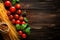 Rustic Italian delight, pasta, tomatoes on rustic background top view