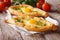 Rustic khachapuri and fresh vegetables close-up. horizontal