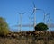 Rustic land, wind farm and blue sky