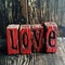 Rustic Love Sign Made of Wooden Blocks