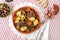 rustic meal of ox tail with potato and carrot