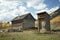 Rustic old cabin and outhouse in Fall Season