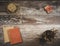 Rustic old vintage wood table with burning incense, incense sticks, natural twine and two small handmade books, with copyspace