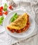 Rustic omelet with tomato
