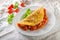 Rustic omelet with tomato