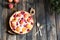 Rustic open pie with peach and raspberry, french galette . Peach tart. Raspberry tart. Tartalette with cream. Variety of bakery.