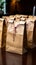 Rustic packaging: Brown paper bags placed artfully on the tabletop.