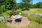 Rustic patio table in a lush garden