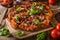 Rustic pizza with minced meat