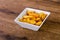 Rustic potato over wooden background