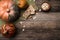 Rustic pumpkins with seeds and cookies on wooden table