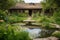 rustic ranch house with garden and pond, surrounded by lush green foliage