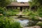 rustic ranch house with garden and pond, surrounded by lush green foliage