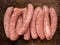 Rustic raw uncooked sausages