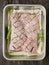 Rustic raw uncooked seasoned pork belly