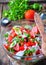 Rustic salad of tomatoes, cucumbers, white onion, red pepper, parsley, seasoned oliveovym oil and balsamic vinegar.