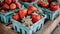 Rustic setting juicy strawberries in wooden crates perfect for natural lit food ads