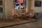 Rustic Sidewalk Cafe with Wooden Tables