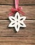 Rustic snowflake decoration on a ribbon