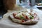 Rustic sourdough pizza ready for the oven