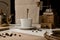 Rustic still life. cup of coffee, handmade wooden grinder, golden kettle and coffee beans on the table. vintage