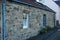 Rustic stone cottage in a small Scottish village.