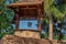 Rustic stone well with bucket and drinking water