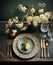 Rustic table with porcelain tableware, glasses, vases and white flowers in green tones