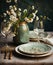 Rustic table with porcelain tableware, glasses, vases and white flowers in green tones