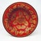 Rustic terracotta ceramic clay bowls and plates with flower pattern. Mexican, Indonesian, Asian decorative ornament.