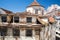 Rustic texture of walls and tile roofs over the old streets of historical city district