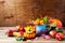 Rustic Thanksgiving arrangement with pumpkins and tagetes flower