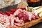 Rustic Tuscan tray with typical products: prosciutto ham, brawn, finocchiona, crostini, salami, tuscan chilli and sliced pecorino