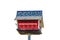 Rustic two story purple martin bird house designed to look like a barn - red with shingles on a pole -isolated on white