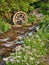 Rustic Water Wheel on Scenic Stream
