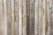 Rustic weathered barn wood background with knots and nail holes