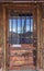 Rustic and weathered old wooden western Door