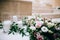Rustic wedding decor, decorated stairs white candles and fresh flowers